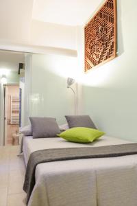Giường trong phòng chung tại The Best Rent - Milan Loreto Apartment