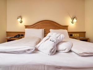 Voodi või voodid majutusasutuse Hotel Bertelli toas