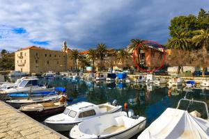 a bunch of boats are docked in a marina at Holiday Home Obrov in Kaštela