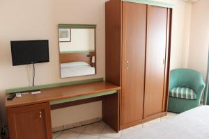 A bed or beds in a room at Villa Giglio