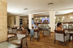 Restoran või mõni muu söögikoht majutusasutuses CALIMERA Delfino Beach Resort & Spa