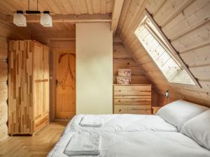 Posteľ alebo postele v izbe v ubytovaní Rezydencja Gubałówka sauna widok