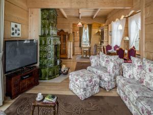 Televízia a/alebo spoločenská miestnosť v ubytovaní Rezydencja Gubałówka sauna widok