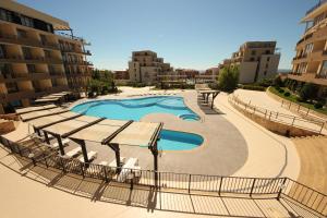 arial view of a swimming pool in a building at Menada Luxor Apartments in Sveti Vlas