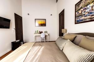 TV a/nebo společenská místnost v ubytování Casa Nostra B&B