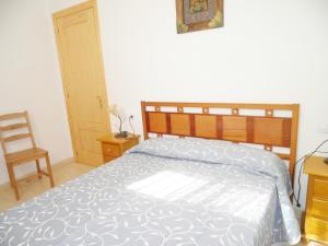 Posteľ alebo postele v izbe v ubytovaní Apartamentos rurales Benafer