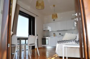 Kuchyň nebo kuchyňský kout v ubytování Residence Tre Palme