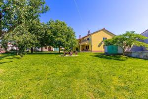 Zahrada ubytování Holiday Home Grande