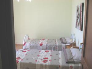 Posteľ alebo postele v izbe v ubytovaní Casa Bruno B&B