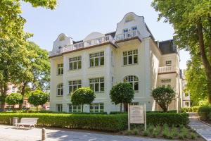 Zahrada ubytování HOTEL am STRAND