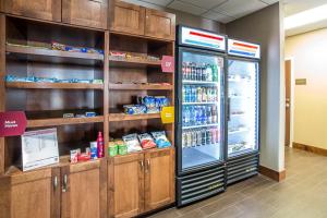 a refrigerator filled with lots of food and drinks at Comfort Suites Moab near Arches National Park in Moab