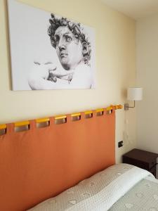 Postel nebo postele na pokoji v ubytování B&B La Casa Di Zefiro
