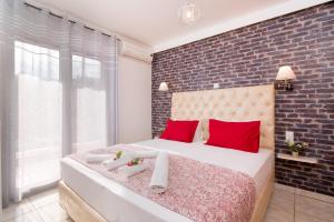Llit o llits en una habitació de Mouses Apartments