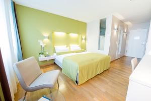 Lova arba lovos apgyvendinimo įstaigoje Nymphe Strandhotel & Apartments