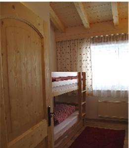 Postel nebo postele na pokoji v ubytování Apartment Großvenedigerblick