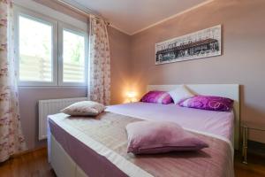 Posteľ alebo postele v izbe v ubytovaní Villa Šima- luxury apartment with private pool + 36 fotografií