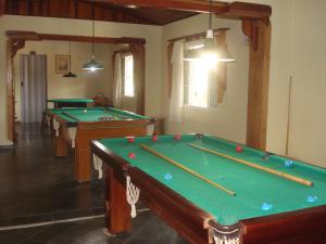 a billiard room with two pool tables in it at Pousada Recanto Águas Vivas com Piscina Aquecida e Lazer Completo próximo a Sorocaba in Turvo dos Góis