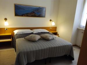 Ένα ή περισσότερα κρεβάτια σε δωμάτιο στο Valentina Apartment