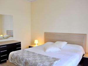 A bed or beds in a room at Holiday Home in Lazise near Lake Garda