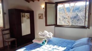 Postel nebo postele na pokoji v ubytování Casa Al Chianti B&B