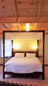 Ein Bett oder Betten in einem Zimmer der Unterkunft Heatherlie Cottages Halls Gap