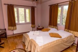 Postel nebo postele na pokoji v ubytování Noring Guest House