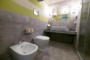 Ein Badezimmer in der Unterkunft Hotel Villamare