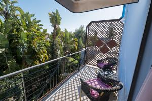 Ein Balkon oder eine Terrasse in der Unterkunft Hotel Villamare