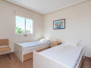 A bed or beds in a room at Villa in Murcia with Private Pool and Garden