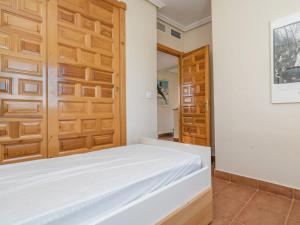 A bed or beds in a room at Villa in Murcia with Private Pool and Garden