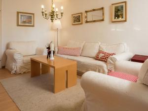 a living room with two couches and a coffee table at Apartment near the Feldberg ski area in Dachsberg im Schwarzwald