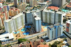 an aerial view of a city with tall buildings at Prive Riviera Park in Caldas Novas