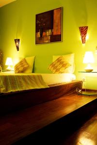 Tempat tidur dalam kamar di La Villa Serere