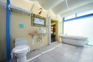 O baie la Ciao House B&B