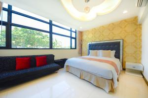 Un pat sau paturi într-o cameră la Ciao House B&B