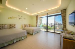 Un pat sau paturi într-o cameră la Ciao House B&B