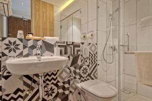 Koupelna v ubytování Timez Hotel Melaka + 37 fotografií
