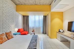TV a/nebo společenská místnost v ubytování Timez Hotel Melaka