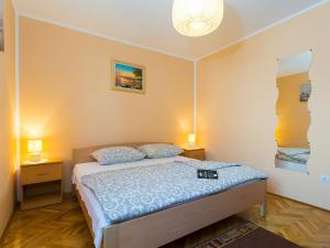 Postel nebo postele na pokoji v ubytování Apartments Davorka