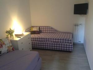 A bed or beds in a room at Suite Luisa Roma