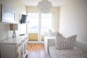 TV a/nebo společenská místnost v ubytování Villa Ocean Place