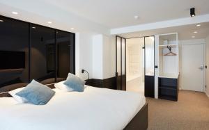 Voodi või voodid majutusasutuse Hotel Nelson toas