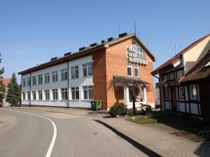 Budova, kde se apartmán nachází + 3 fotografie