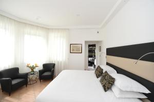 Postel nebo postele na pokoji v ubytování Bella Sorrento B&B
