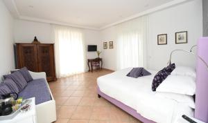 Postel nebo postele na pokoji v ubytování Bella Sorrento B&B