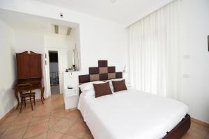 Postel nebo postele na pokoji v ubytování Bella Sorrento B&B