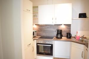 Kuchyň nebo kuchyňský kout v ubytování Villa Ocean Place