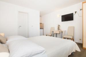 Apartments Zanic on The Beach客房内的一张或多张床位