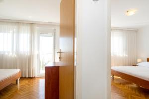Apartments Zanic on The Beach客房内的一张或多张床位