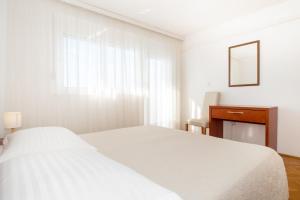 Apartments Zanic on The Beach客房内的一张或多张床位